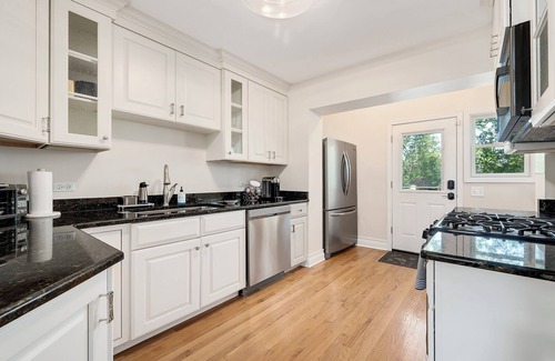 Wheaton House | Charming Cape Cod inspired home offering comfort and style for your time away.