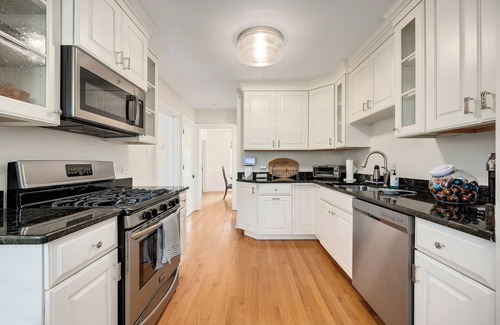 Wheaton House | Charming Cape Cod inspired home offering comfort and style for your time away.
