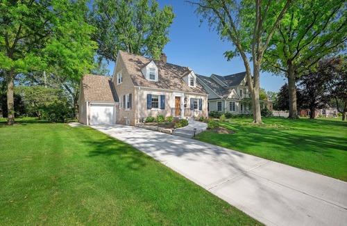 Wheaton House | Charming Cape Cod inspired home offering comfort and style for your time away.