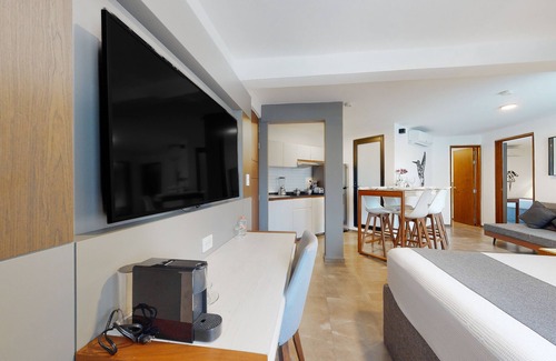 Downtown Cancun Hotel | Charming condo with kitchenette, balcony, & pool