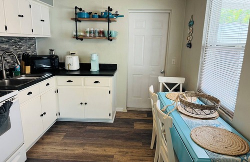 Largo House | Charming cottage sleeps 6 with jacuzzi and firepit minutes to beach pets welcome