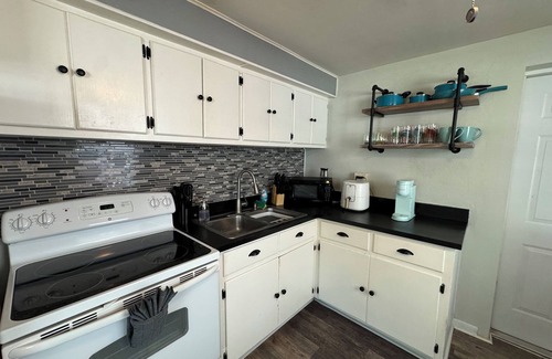 Largo House | Charming cottage sleeps 6 with jacuzzi and firepit minutes to beach pets welcome
