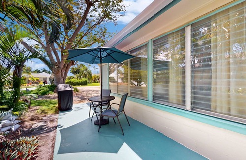 Naples Park Cottage | Charming Cottage Steps from Beach - Dog-Friendly with Bikes & Beach Gear