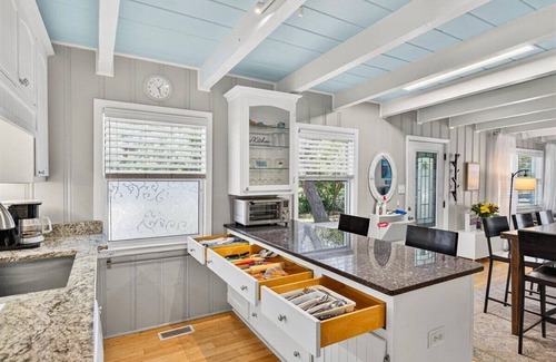 Yaupon Beach House | Charming dog-friendly bungalow, just a SHORT walk to beach Hot tub Fire Pit