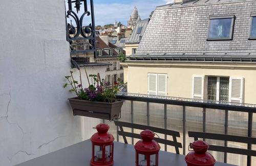 Quartier du Faubourg-Montmartre Apartment | Charming Duplex in Paris w/Terrace, view on Sacred-Coeur