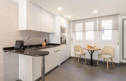 Barrio de La Latina Apartment | Charming Duplex Retreat for 4 Latina Toledo Ático III