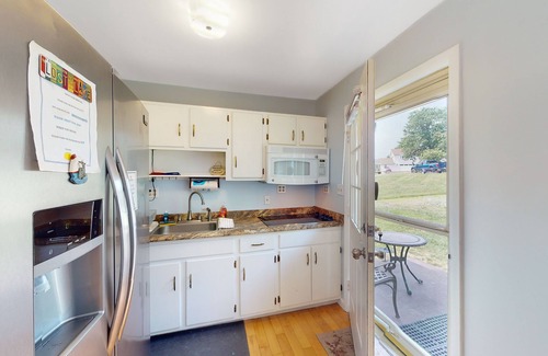 Aspen Hill House | Charming getaway with a fireplace, large deck, paddle boards & porch swing