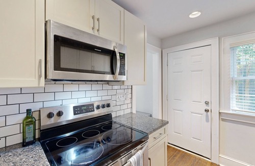 Charlotte House | Charming House with Cozy Patio and Firepit for Relaxing Evenings