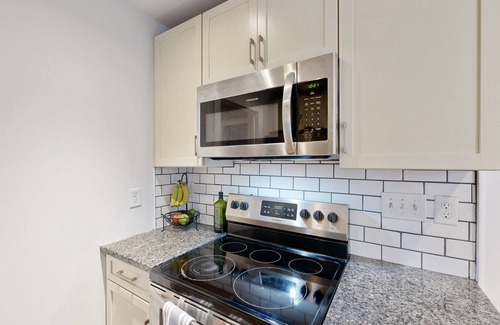 Charlotte House | Charming House with Cozy Patio and Firepit for Relaxing Evenings