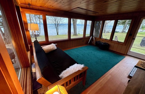 Cedar Cottage | Charming lake house combines rustic ambiance with modern amenities.