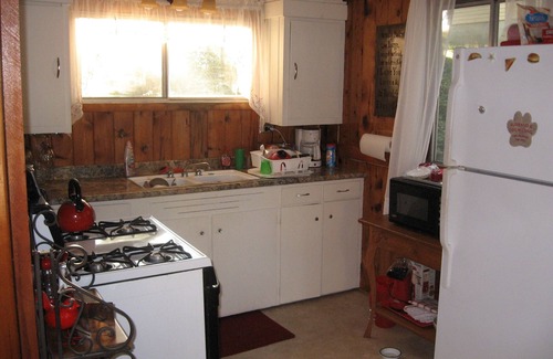 Evart Cottage | Charming Lakefront Cottage, Private Sandy Beach, Excellent Fishing