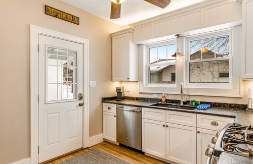 Minocqua House | Charming lakefront home with shared dock, porch, & sunroom - walk downtown