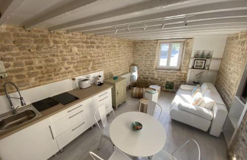 Luc-sur-Mer House | Charming little house with exposed stonework
