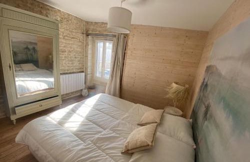Luc-sur-Mer House | Charming little house with exposed stonework