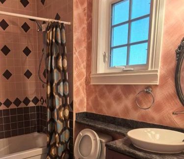 West Side House | Charming Retreat on Cypress St Rooms with share living space