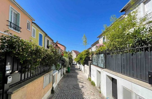Amerique House | Charming townhouse with garden in the City of Love by easyBNB
