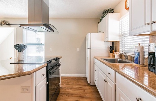 Madeira Beach Cottage | Charming Upstairs Unit in a Cottage, steps to the beach. Across from John's Pass