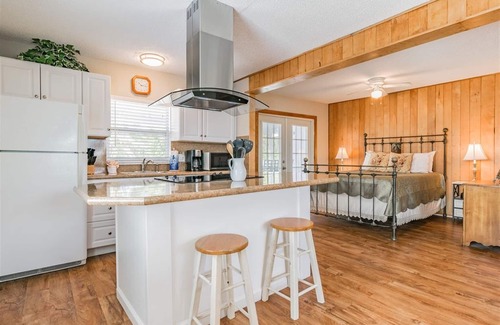 Madeira Beach Cottage | Charming Upstairs Unit in a Cottage, steps to the beach. Across from John's Pass