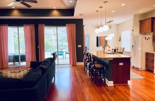 Winter Haven House | Cheerful 4 Bed, 3 Bath Home with Screened Pool
