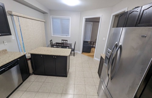 Alcona House | Cheerful 4 Bedroom house with indoor fireplace
