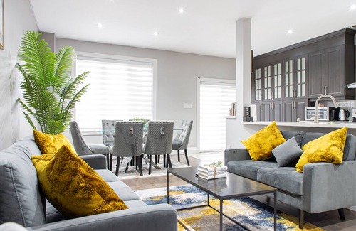 Brampton West House | Cheerful Home in Downtwon w/hot tub