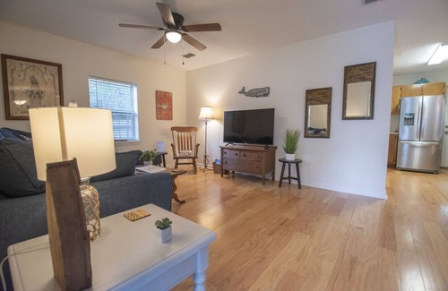 St. Marys House | Cheerful Red Brick Cottage in Downtown St. Marys!