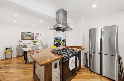 North Druid Hills House | Chef's Kitchen; King Bed, Queen & Bunk Bed, 65" TV