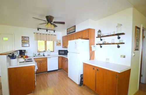 Great Cacapon House | Chesnutt Cabin - riverfront, fire pit, fireplace, game room, king bed
