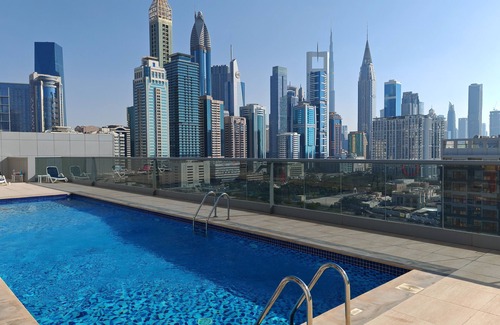Al Satwa Apartment | Chic 1-bedroom apartment in enchanting Dubai with WiFi, fitness room