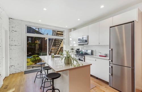 West Town Apartment | Chic 2-Bed, 2-Bath Flat, Courtyard & Fire Pit in Ukrainian Village, Chicago!