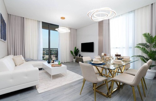 Dubai Production City Apartment | Chic 2BR Urban Retreat w/Captivating Dubai Views