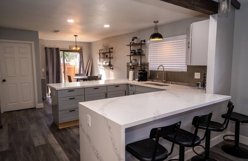Raisin Condo | Chic condo with pool access- and beautiful courtyard inside home