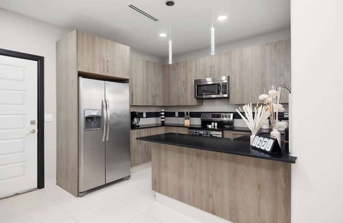 McAllen House | Chic Monochrome Living: Where Style Meets Comfort