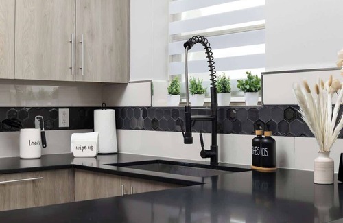 McAllen House | Chic Monochrome Living: Where Style Meets Comfort