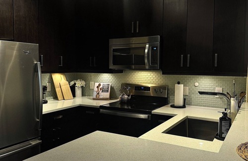 Optimist Park Apartment | Chic Retreat: Elegance Awaits