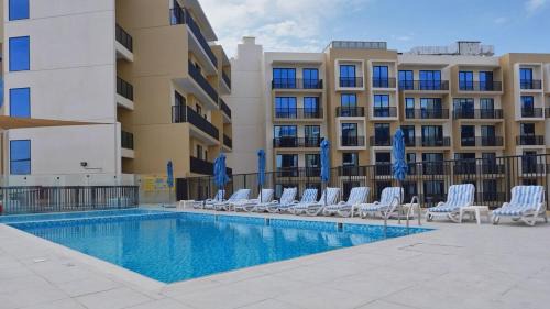 Al Hamra Village Apartment | Chic Studio with Lagoon Views Walk Beach and Golf