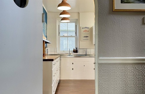 Beaumaris House | Chimney Corner is superb for large gatherings of family or friends