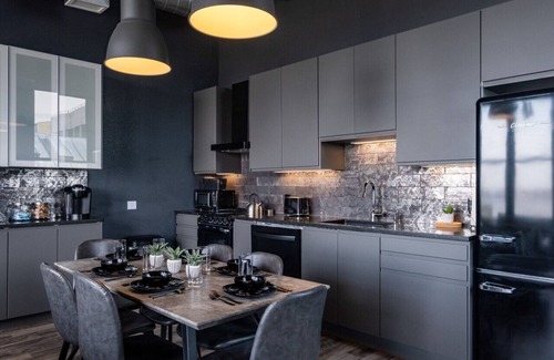 West Main Historic District Condo | City Loft Escape with River Views! By Hollyhock
