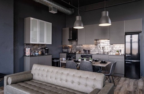 West Main Historic District Condo | City Loft Escape with River Views! By Hollyhock