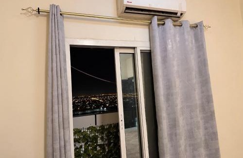 Ajman Apartment | City view furnished room