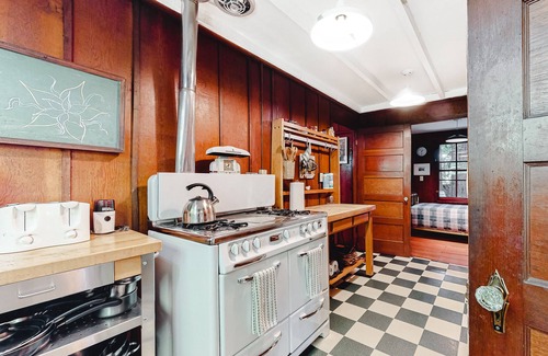 Guerneville House | Classic cabin steps to river, beach - private hot tub & fireplace - dog-friendly