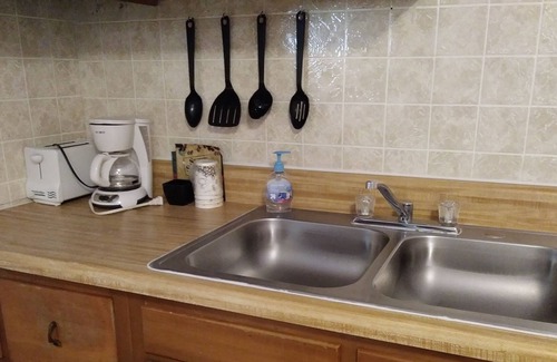 Bryson City Cottage | Clean Cottage on the River in Bryson City, NC. Fish & grill your catch here!