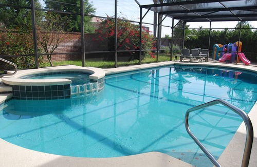 West Kissimmee House | CLEAN! Themed rooms, HUGE pool,private yard, GREAT reviews, Game room, FreeGrill