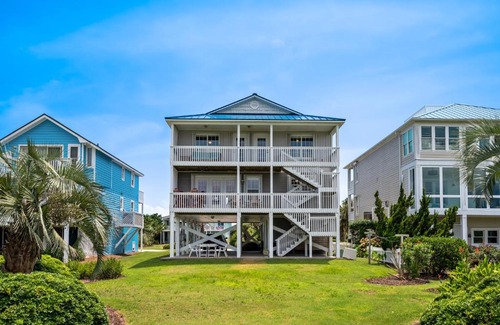 Caswell Beach House | Clear For Take Off by Oak Island Accommodations