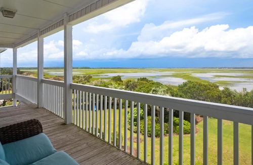 Caswell Beach House | Clear For Take Off by Oak Island Accommodations