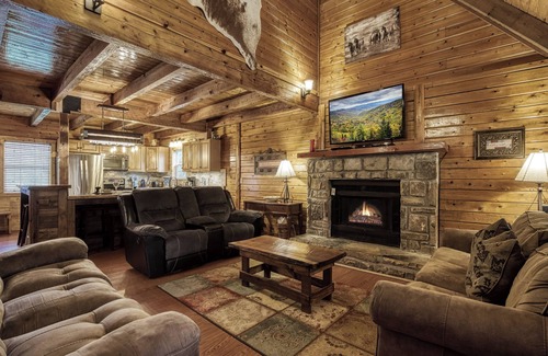 Pigeon Forge Cabin | Close to Pigeon Forge and Dollywood- Sleeps 20-Indoor Putt Putt-Outdoor Pool Access-Dog Friendly