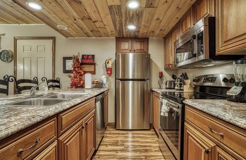 Gatlinburg - Pigeon Forge Ski Chalet | Close to Pigeon Forge outdoor pool access view the pool from the deck sleeps 5
