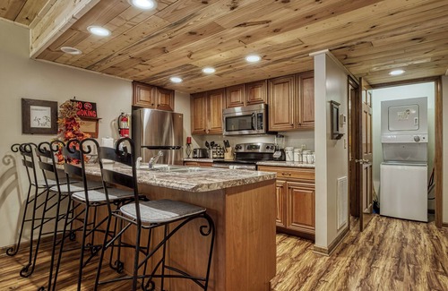 Gatlinburg - Pigeon Forge Ski Chalet | Close to Pigeon Forge outdoor pool access view the pool from the deck sleeps 5