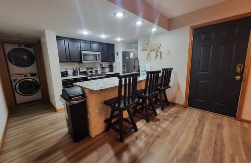 Pigeon Forge Ski Chalet | Close to Pigeon Forge- walking distance to outdoor pool-Outdoor kitchen and tv area and much more