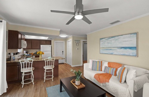Siesta Key Condo | Coastal Breeze Siesta: Waterfront 4-Unit Retreat – Walk to Turtle Beach, Boat Dock & Free Beach Gear